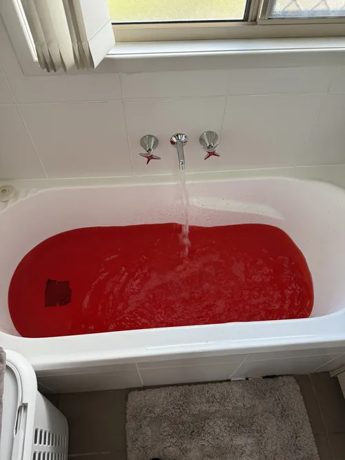 water leak detection dye test on a bath in chermside